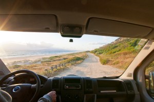 Driving Atlantic Campers van along the ocean in Portugal