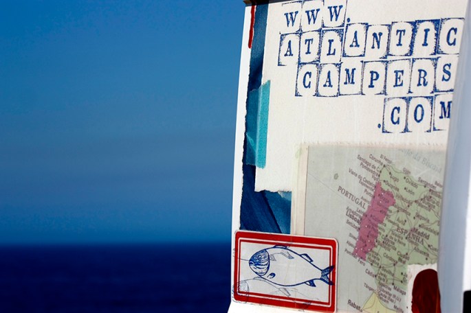 Atlantic Campers logo and the blue sea